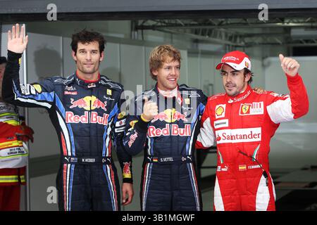 22. Oktober 2010 - Top drei im Qualifying parc Ferme (L bis R): Mark Webber (aus) Red Bull Racing, Zweiter; Sebastian Vettel (GER) Red Bull Racing, Pole Position; Fernando Alonso (ESP) Ferrari, Third...Formel-1-Weltmeisterschaft, Rd 17, Grand Prix von Korea, Qualifying Day, Korea International Circuit, Yeongam, Südkorea, Samstag, 23. Oktober 2010. (Foto: © Sutton Motorsports/ZUMApress.com) Stockfoto