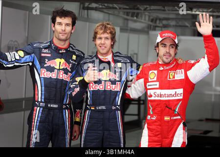 22. Oktober 2010 - Top drei im Qualifying parc Ferme (L bis R): Mark Webber (aus) Red Bull Racing, Zweiter; Sebastian Vettel (GER) Red Bull Racing, Pole Position; Fernando Alonso (ESP) Ferrari, Third...Formel-1-Weltmeisterschaft, Rd 17, Grand Prix von Korea, Qualifying Day, Korea International Circuit, Yeongam, Südkorea, Samstag, 23. Oktober 2010. (Foto: © Sutton Motorsports/ZUMApress.com) Stockfoto