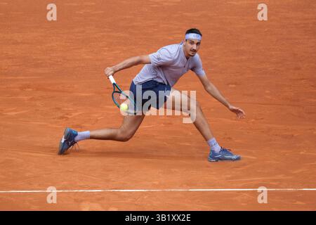 Lorenzo Sonego im Kampf gegen Alex de Minaur bei den Mutua Madrid Open am 26. April 2025 in Madrid Stockfoto