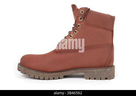 Ein Lederstiefel auf weißem Hintergrund, Seitenansicht Stockfoto