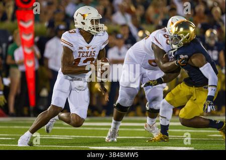 5. September 2015: Texas Quarterback Jerrod hörte #13 Scrambles während Notre Dame's Sieg 38-3 über Texas in South Bend. Reagan Lunn/CSM(Bild: © CSM via ZUMA Wire) Stockfoto