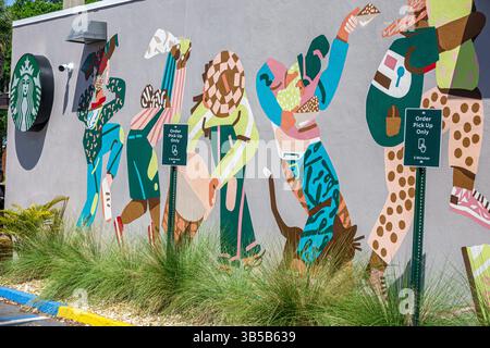 Orlando Florida, College Park Viertel, Edgewater Drive, Starbucks Kaffee, Außenfassade, Wandgemälde, moderne abstrakte Kunstwerke, vielfältige Menschen Stockfoto