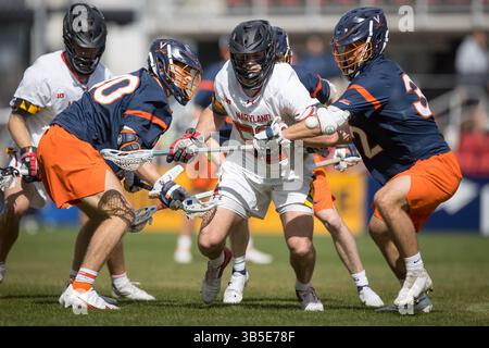 19. März 2022: Maryland Terrapins Luke Wierman (52) und eine Gruppe Virginia Cavaliers jagen den Ball während des NCAA Men's Lacrosse Regular Season Spiels zwischen den Virginia Cavaliers und den Maryland Terrapins im Audi Field in Washington, D.C. Fotograf: Cory Royster (Kreditbild: © Cory Royster/CSM via ZUMA Press Wire) Stockfoto