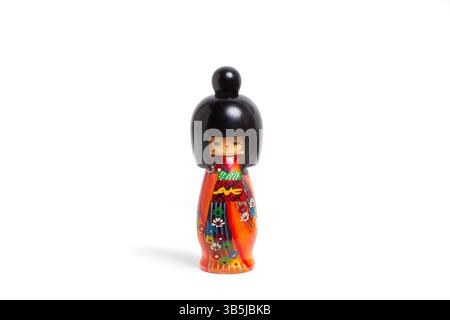 Eine Japanesse-Puppe isoliert auf weißem Hintergrund mit Kopierraum Stockfoto