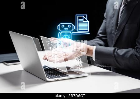 Geschäftsmann mit Laptop mit KI-Symbol oder Roboter mit künstlicher Intelligenz für die Automatisierung von Geschäftsprozessen in der Hand. Technologische Innovation auf einem VI Stockfoto