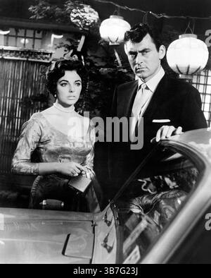 11. Februar 2022, USA: Joan Collins, Ken Scott, am Set des Films „Stopover Tokyo“, 20th Century-Fox, 1957 (Bild: © JT Vintage Via ZUMA Press Wire) Stockfoto