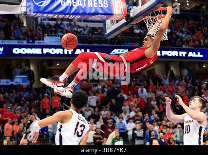März 2024: NC State Wolfpack Guard (14) Casey Morsell taucht den Ball während eines ACC Männer Basketball Turniers zwischen den UVA Cavaliers und dem NC State Wolfpack in der Capital One Arena in Washington, D.C. Justin Cooper/CSM (Credit Image: © Justin Cooper/CSM via ZUMA Press Wire) Stockfoto