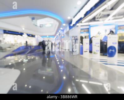 Shopping Mall blur Hintergrund mit Bokeh. Abstrakte verschwommen Eingangsbereich von Kleidung und Schuhe zu speichern. Platz kopieren Stockfoto