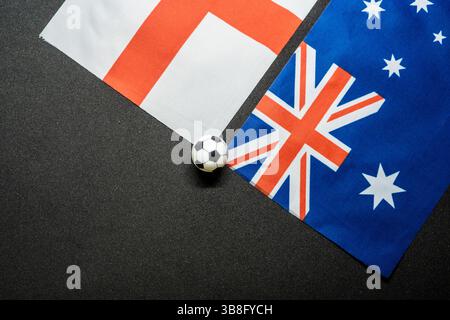 England gegen Australien, Fußballspiel mit Nationalflaggen Stockfoto