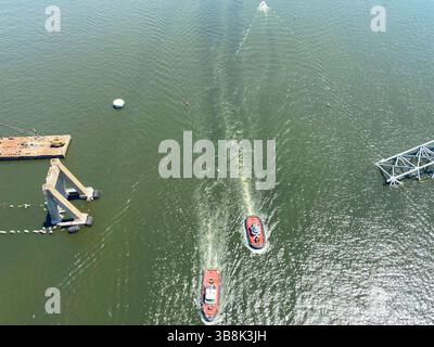 26. Mai 2024, Dundalk, MD, Vereinigte Staaten von Amerika: Luftaufnahme der verbleibenden Teile der zusammengebrochenen Francis Scott Key Bridge, nachdem die meisten Trümmer und das Frachtschiff MV Dali am 26. Mai 2024 in der Nähe von Dundalk, Maryland entfernt wurden. Der Fort McHenry Federal Channel wurde wieder eröffnet, so dass der Betrieb im Hafen von Baltimore wieder aufgenommen werden kann. (Bild: © Bobby Petty/US Army/Planet Pix via ZUMA Press Wire) Stockfoto