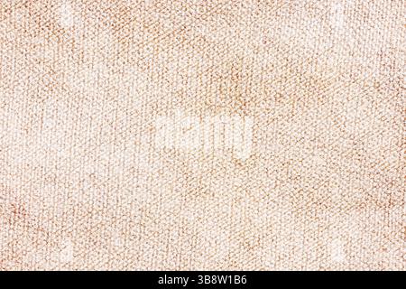 Braune Leinwandstruktur. Nahaufnahme aus gewebtem Naturstoff. Raue Textiloberfläche. Details zum Hintergrundmaterial. Stockfoto