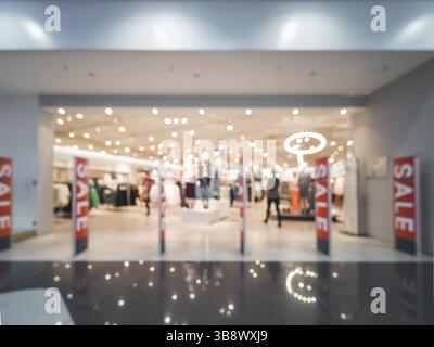 Shopping Mall blur Hintergrund mit Bokeh. Abstrakte verschwommen Eingangsbereich von Kleidung und Schuhe zu speichern. Platz kopieren Stockfoto