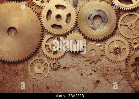 Steampunk-Hintergrund von mechanischen Uhren Details über alte Metall Hintergrund. Im Inneren der Uhr, Zahnräder Stockfoto