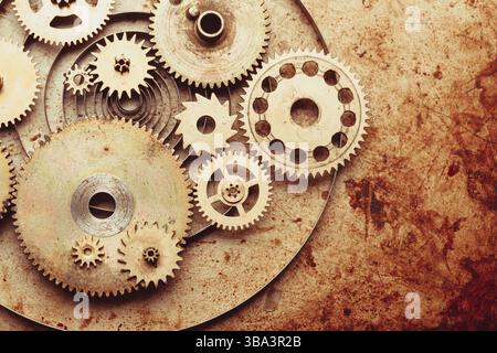 Steampunk-Hintergrund von mechanischen Uhren Details über alte Metall Hintergrund. Im Inneren der Uhr, Zahnräder Stockfoto