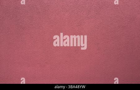 Leere rote Betonwand, saubere Textur Hintergrundfläche Stockfoto