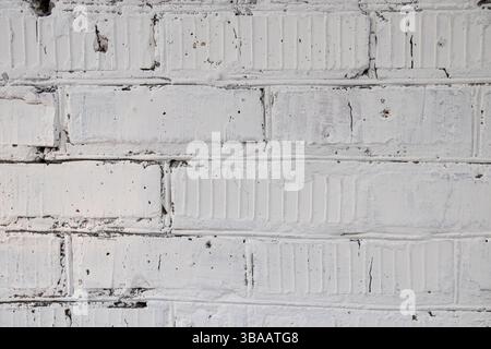 Weiße Backsteinmauer als Hintergrund, altes Backsteingebäude Stockfoto