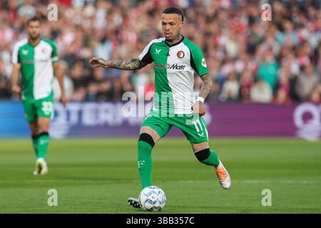 Rotterdam, Niederlande. Mai 2025. ROTTERDAM, NIEDERLANDE - 14. MAI: Quilindschy Hartman aus Feyenoord spielt mit dem Ball während des niederländischen Eredivisie-Spiels zwischen Feyenoord und RKC Waalwijk am 14. Mai 2025 im Stadion Feijenoord in Rotterdam. (Foto von Hans van der Valk/Orange Pictures) Credit: Orange Pics BV/Alamy Live News Stockfoto