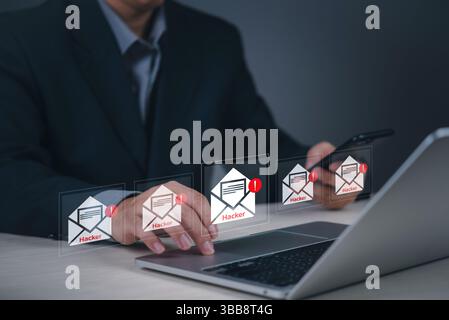 Geschäftsleute, die mehrere Phishing-E-Mails empfangen, die als Hacker gekennzeichnet sind, bedrohen Laptop und Smartphone. Cybersicherheitskonzept E-Mail-Betrug, Online-Betrug und di Stockfoto