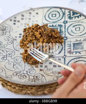 Pilz-Risotto auf einer dekorativen Platte Stockfoto