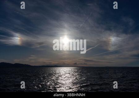 Sonnenhund-Phänomen über dem Bodensee Stockfoto