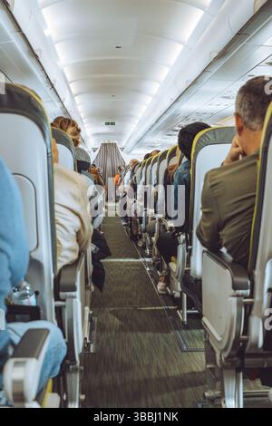 Innerhalb Des Flugzeugs, Reihen, Gang, Passagiere, Stockfoto