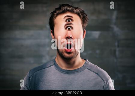Junger Mann mit vertikaler Augencollage, emotionales Porträt Stockfoto