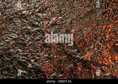 Die Textur der glänzende Alufolie hautnah Stockfoto