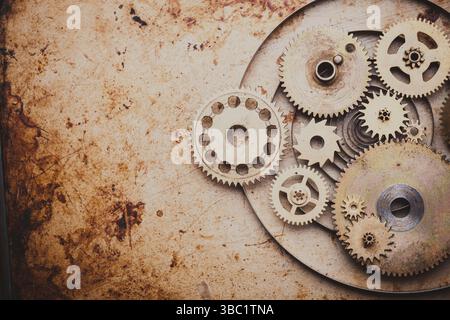 Steampunk-Hintergrund von mechanischen Uhren Details über alte Metall Hintergrund. Im Inneren der Uhr, Zahnräder Stockfoto