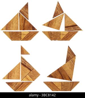 Vier abstrakte Bilder von Segelbooten, die aus sieben Tangram-Holzstücken gebaut wurden, ein traditionelles chinesisches Puzzlespiel Stockfoto