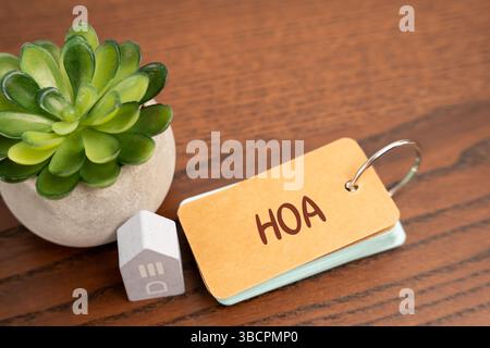 HOA Homeowner Association Konzept. Organisation in einer Wohngemeinschaft, die Regeln und Vorschriften durchsetzt, gemeinsame Bereiche verwaltet und se bereitstellt Stockfoto