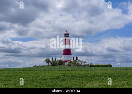 Happisburgh, Vereinigtes Königreich - 13. Juni 2022: Blick auf den historischen Leuchtturm von Happisburgh an der norfolkreichen Küste Englands Stockfoto