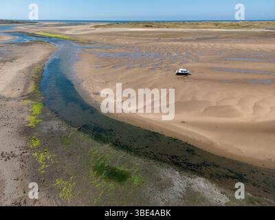 Ebbe in der Nähe des Dorfes Ravenglass an der Küste von Cumbria im Nordwesten Englands. Stockfoto