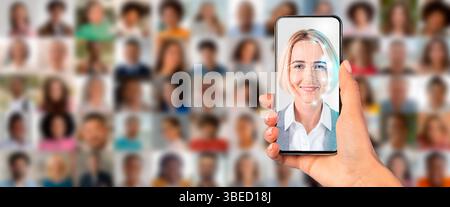 Handheld-Smartphone mit Gesichtserkennungstechnologie und Porträts Stockfoto
