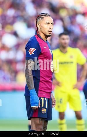 Barcelona, Spanien. Mai 2025. Raphinha (11) vom FC Barcelona wurde während des Spiels der LaLiga zwischen dem FC Barcelona und Villarreal im Estadio Olimpico de Montjuic in Barcelona gesehen. Stockfoto