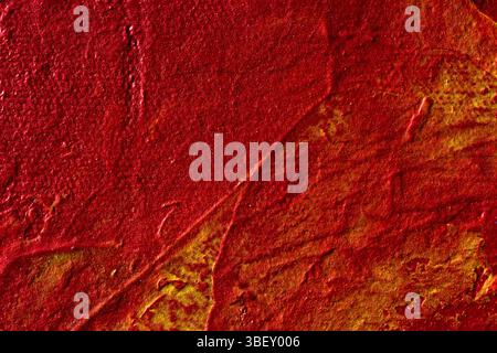 Abstrakte strukturierte rote und goldfarbene Ölfarbe Nahaufnahme Stockfoto