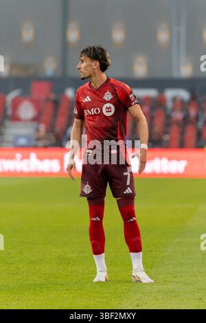 Toronto, Kanada. Mai 2025. Theo Corbeanu #7 des Toronto FC läuft während des MLS-Spiels zwischen Toronto FC und Philadelphia Union im BMO Field auf dem Feld. Endpunktzahl Philadelphia Union 2-1 Toronto FC. Am 28. Mai 2025 in Toronto, Kanada. (Foto: Leonardo Ramirez/Eyepix Group/SIPA USA) Credit: SIPA USA/Alamy Live News Stockfoto