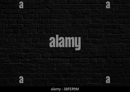 Schwarze Ziegelwand. Inneneinrichtung im Loft. Schwarze Farbe der Fassade Stockfoto