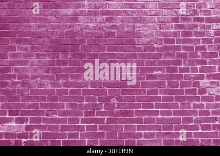 Rosafarbene Ziegelwand. Innenausstattung eines modernen Loft. Hintergrund für Foto- und Videoaufnahmen. Die Fassade eines Ziegelgebäudes Stockfoto