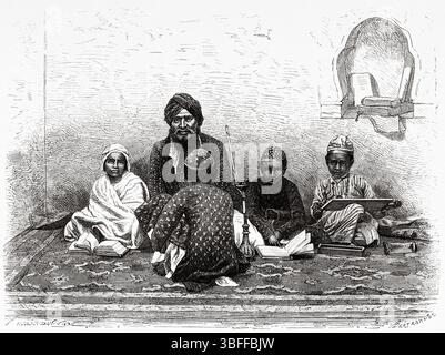 Kinder an einer islamischen Schule in Allahabad, Uttar Pradesh, Indien. Zeichnung von A. Duvivier. Reise in Zentralindien und in die Präsidentschaften von Bombay und Bengalen, 1876 von Louis Theophile Marie Rousselet (1845–1929) Le Tour du Monde 1874 Stockfoto