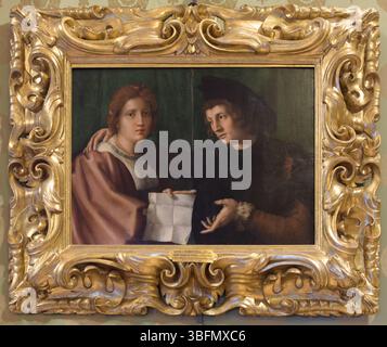 Doppelporträt eines Mannes und einer Frau aus der Renaissance in edlen Gewändern, die einen gefalteten Buchstaben austauschen, vor grünem Hintergrund. Stockfoto