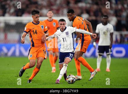 Aktenfoto vom 07/24 von Tijjjani Reijnders (links) und Phil Foden aus England. Manchester City hat mit dem AC Milan eine Gebühr für den niederländischen Mittelfeldspieler Tijjani Reijnders vereinbart. Ausgabedatum: Mittwoch, 4. Juni 2025. Stockfoto