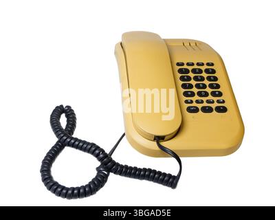 Altes analoges Drucktastentelefon mit Telefonempfänger und Ringkabel vor weißem Hintergrund Stockfoto