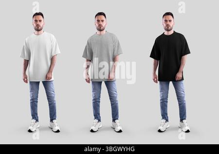 Vorlage aus weißem, heidekrautem, schwarzem Oversize-T-Shirt auf durchgehendem bärtigen Mann, Jeans, Sneakers, Vorderansicht, für Design, Branding. Modisches Set Stockfoto