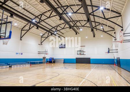Melbourne Florida, Eau Gallie Arts District, Highland Avenue, Civic Center, Basketballfeld im Innenbereich, Sporthalle, Parkettboden, Bleachern Stockfoto