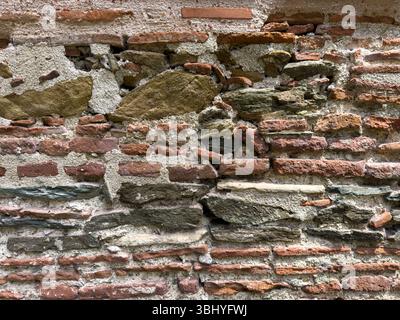 Alte Grunge Ziegelsteinwand grafische Textur Hintergrund Stockfoto