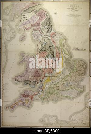 William Smiths geologische Karte von 1815 nannte Eine Abgrenzung der Schichten von England und Wales mit einem Teil Schottlands. Es war die erste geologische Karte dieses Typs. Nach Einer Abgrenzung der Schichten von England und Wales, mit einem Teil Schottlands; mit den Collieries and Mines, die Marshes and Fen Lands, die ursprünglich vom Meer überflossen wurden, und die Sorten des Bodens ... von W. Smith. (Geologische Tabelle britischer organisierter Fossilien. Stockfoto
