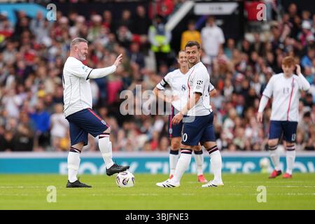 Der englische Spielertrainer Wayne Rooney und Jack Wilshere (rechts) während der Soccer Aid für UNICEF 2025 in Old Trafford, Manchester. Bilddatum: Sonntag, 15. Juni 2025. Stockfoto