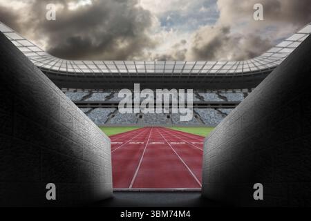 Leere rote Laufbahn taucht aus einem Betontunnel in einem flachen Stadion mit Ständen auf Stockfoto