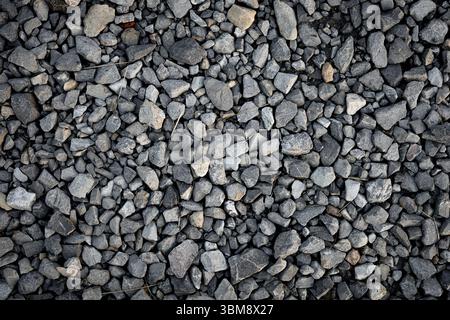 Kleine graue Steinkieschen Hintergrundstruktur Stockfoto