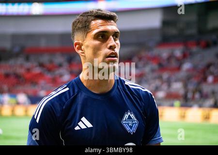 Vancouver, Kanada. Juni 2025. Vancouver, British Columbia, Kanada, 25. Juni 2025: Daniel Rios (14 Vancouver Whitecaps FC) während der Aufwärmphase vor dem Major League Soccer Spiel zwischen Vancouver Whitecaps FC und San Diego FC im BC Place Stadium in Vancouver, British Columbia, Kanada (NUR REDAKTIONELLE VERWENDUNG). (Amy Elle/SPP) Credit: SPP Sport Press Photo. /Alamy Live News Stockfoto